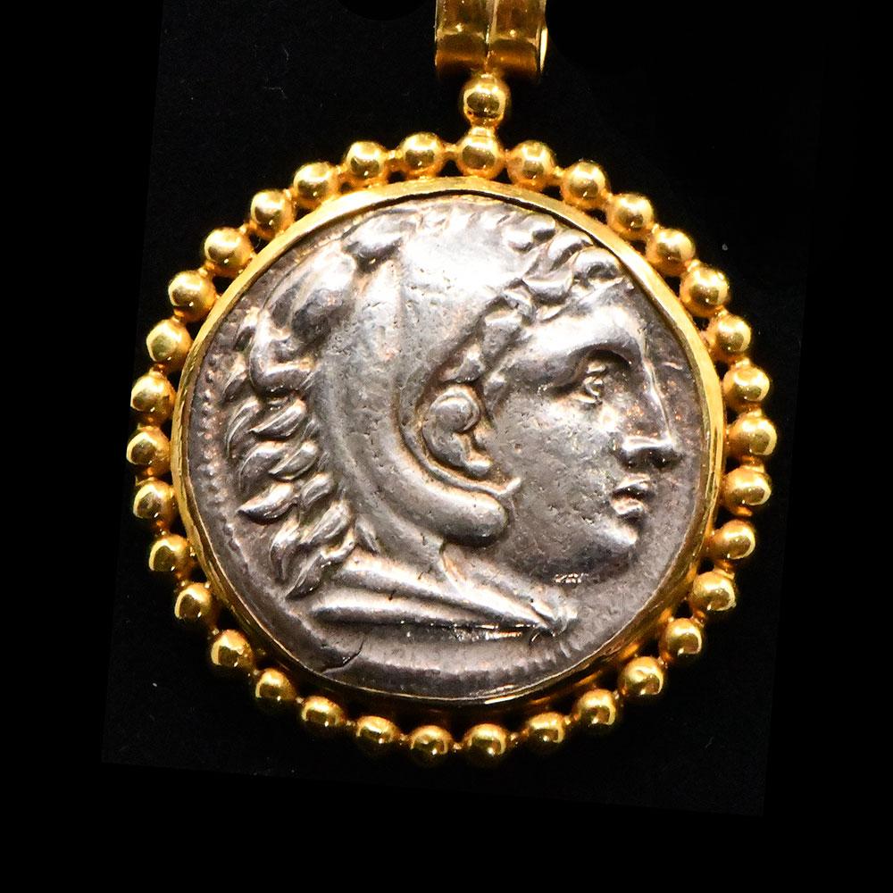 A silver Tetradrachm of Alexander the Great set as a pendant, ca. 336 - 323 BCE