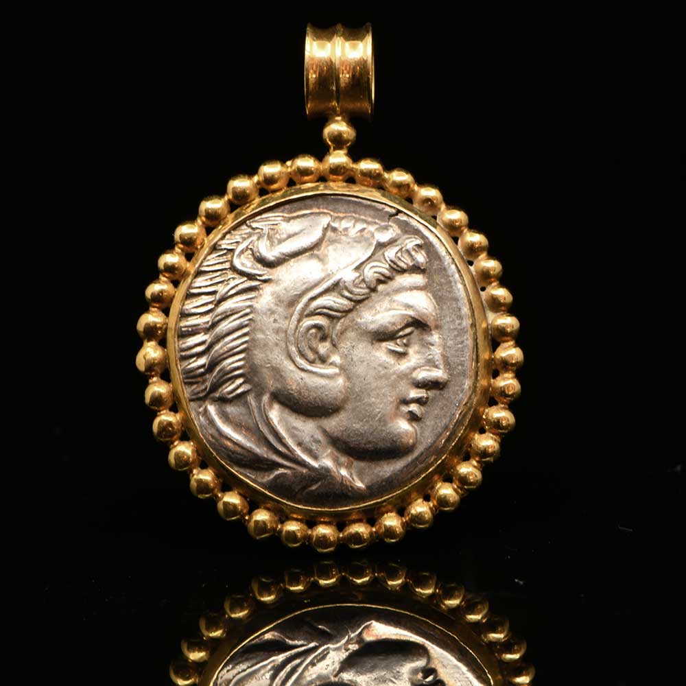 A silver Tetradrachm of Alexander the Great set as a pendant, ca. 336 - 323 BCE