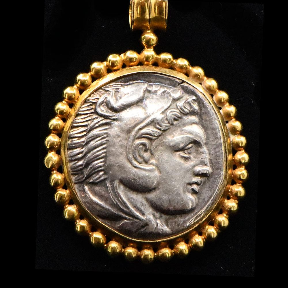 A silver Tetradrachm of Alexander the Great set as a pendant, ca. 336 - 323 BCE