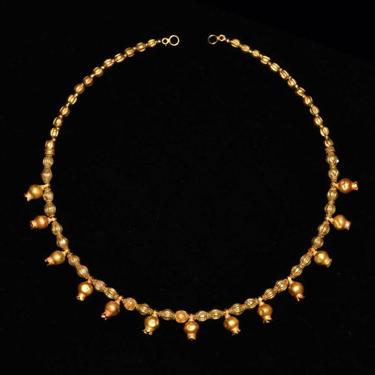 A Greek Gold Pomegranate Necklace, Hellenistic Period, ca. 3rd - 2nd century BCE