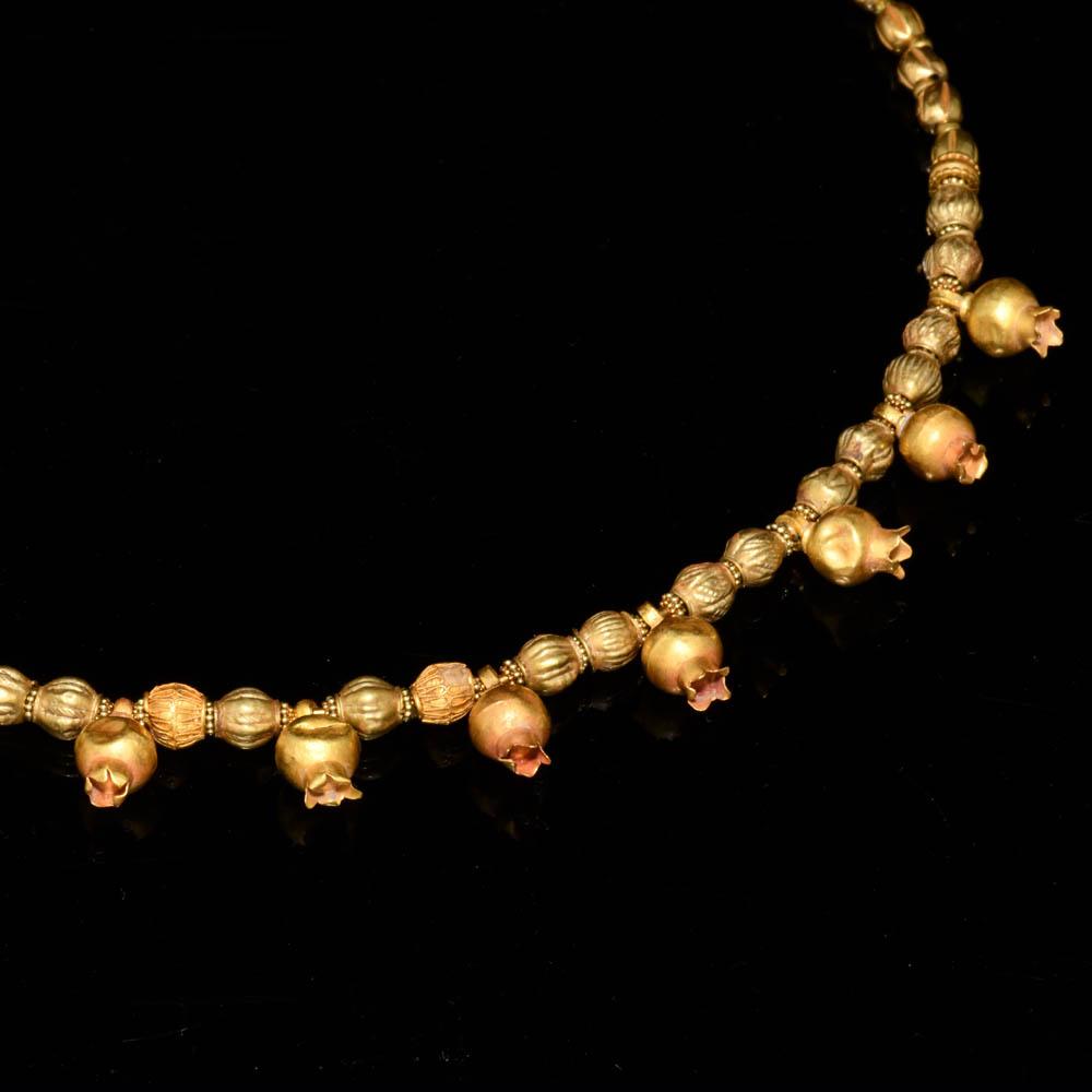 A Greek Gold Pomegranate Necklace, Hellenistic Period, ca. 3rd - 2nd century BCE