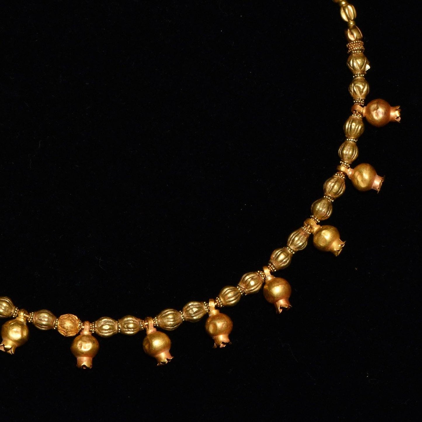 A Greek Gold Pomegranate Necklace, Hellenistic Period, ca. 3rd - 2nd century BCE