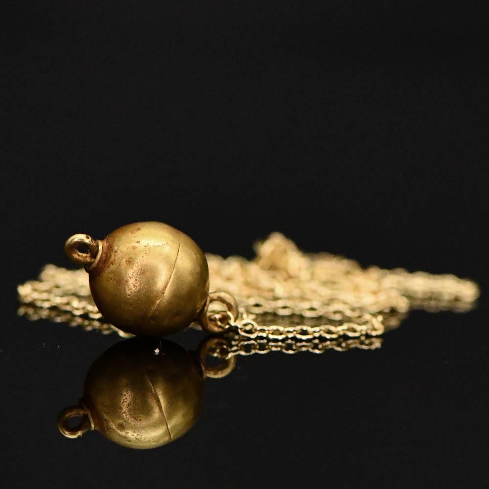 A Greek Gold Ball Bead Pendant, Hellenistic Period, ca. 3rd - 1st century BCE