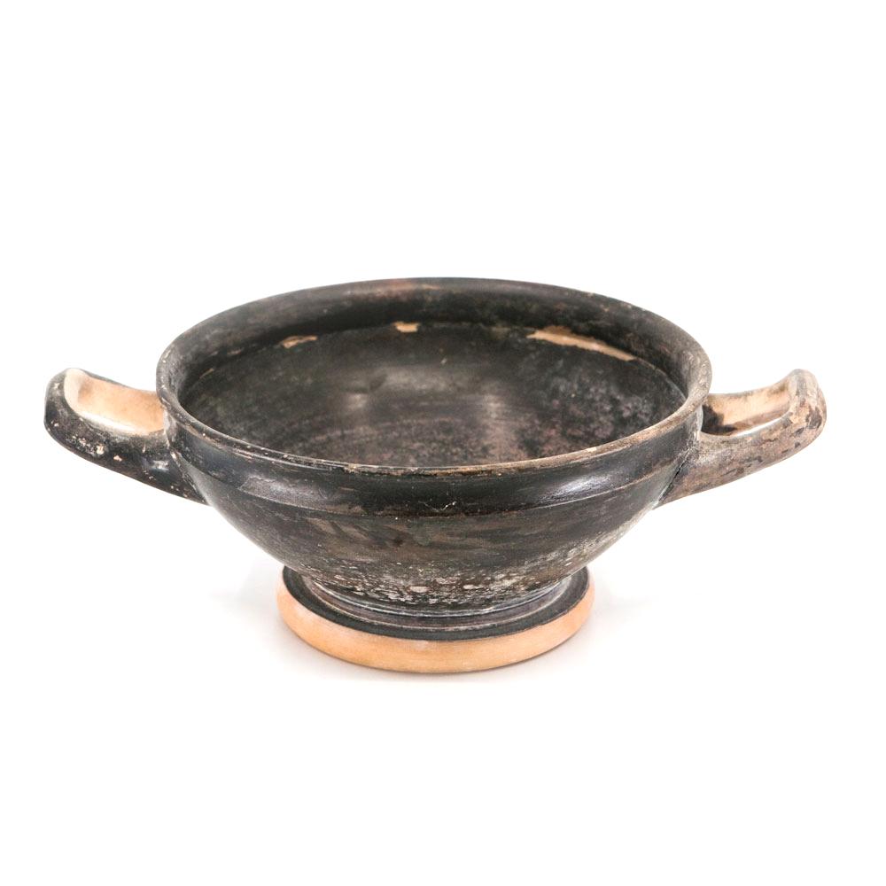 An Attic Black-Glazed Stemless Kylix, ca. 4th century BCE