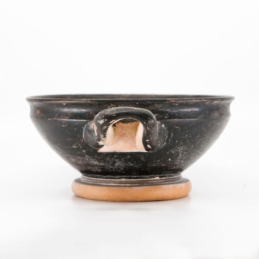 An Attic Black-Glazed Stemless Kylix, ca. 4th century BCE
