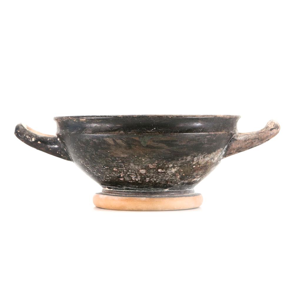 An Attic Black-Glazed Stemless Kylix, ca. 4th century BCE