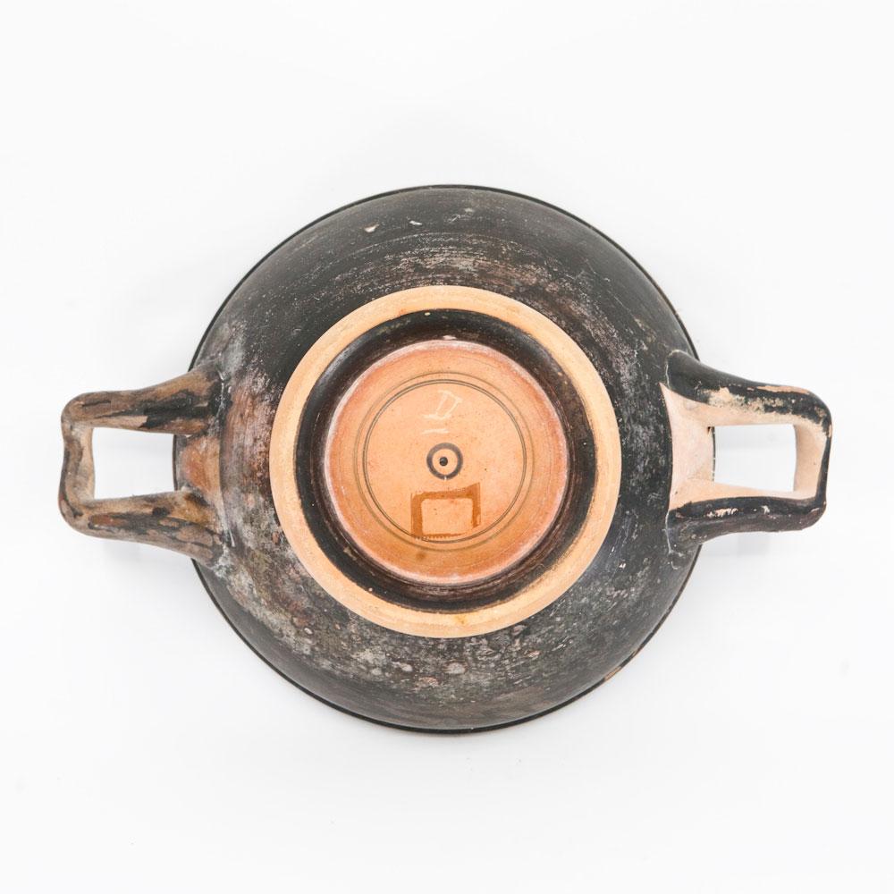 An Attic Black-Glazed Stemless Kylix, ca. 4th century BCE