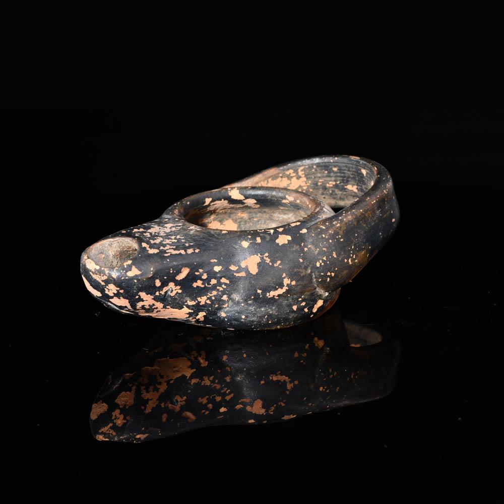 An Attic Black Glazed Oil Lamp, ca. 5th century BCE