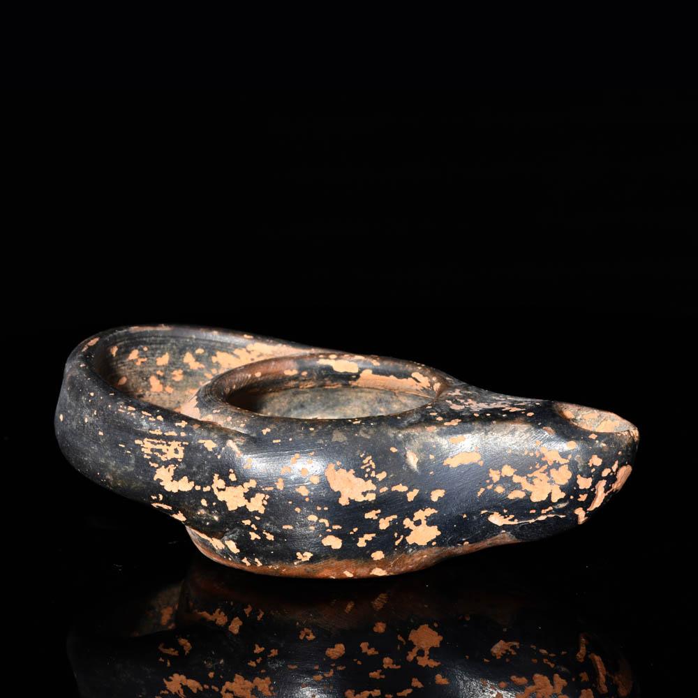 An Attic Black Glazed Oil Lamp, ca. 5th century BCE