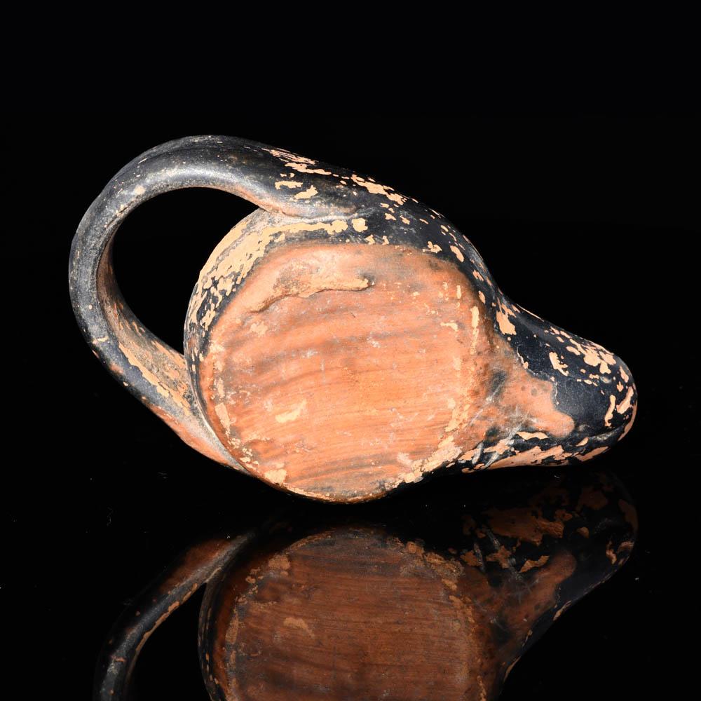 An Attic Black Glazed Oil Lamp, ca. 5th century BCE