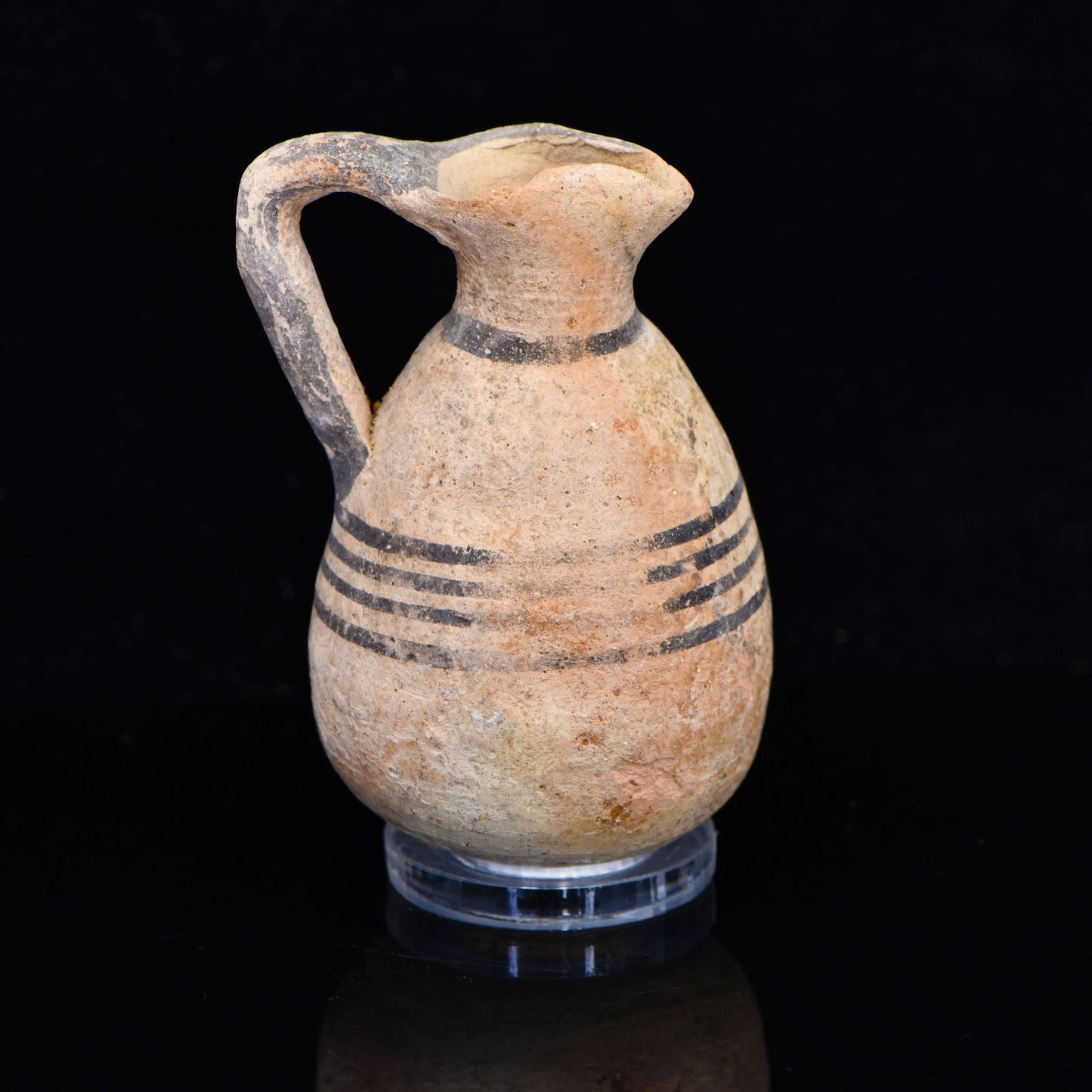 A small Cypro-Phoenician Black on Red Ware Juglet, Iron Age II A-B, ca. 900 - 800 BCE