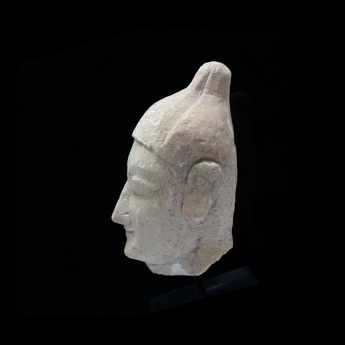 A Cypriot Limestone Head of a Youth, Archaic Period, 600-500 BCE