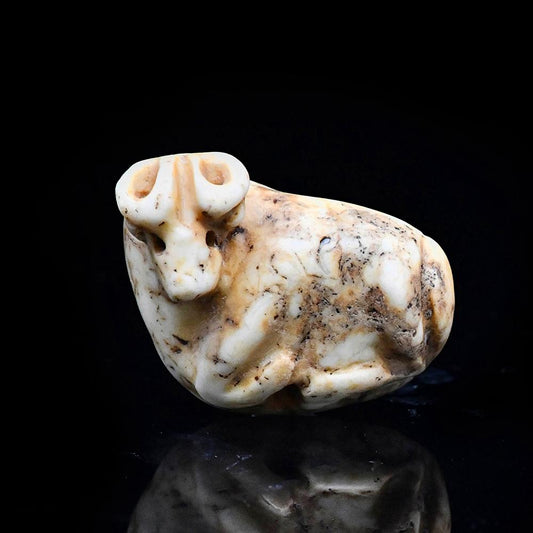 A Sumerian Marble Bull Stamp Seal, Late Uruk/Jemdet Nasr Period, ca. 3100-2900 BCE