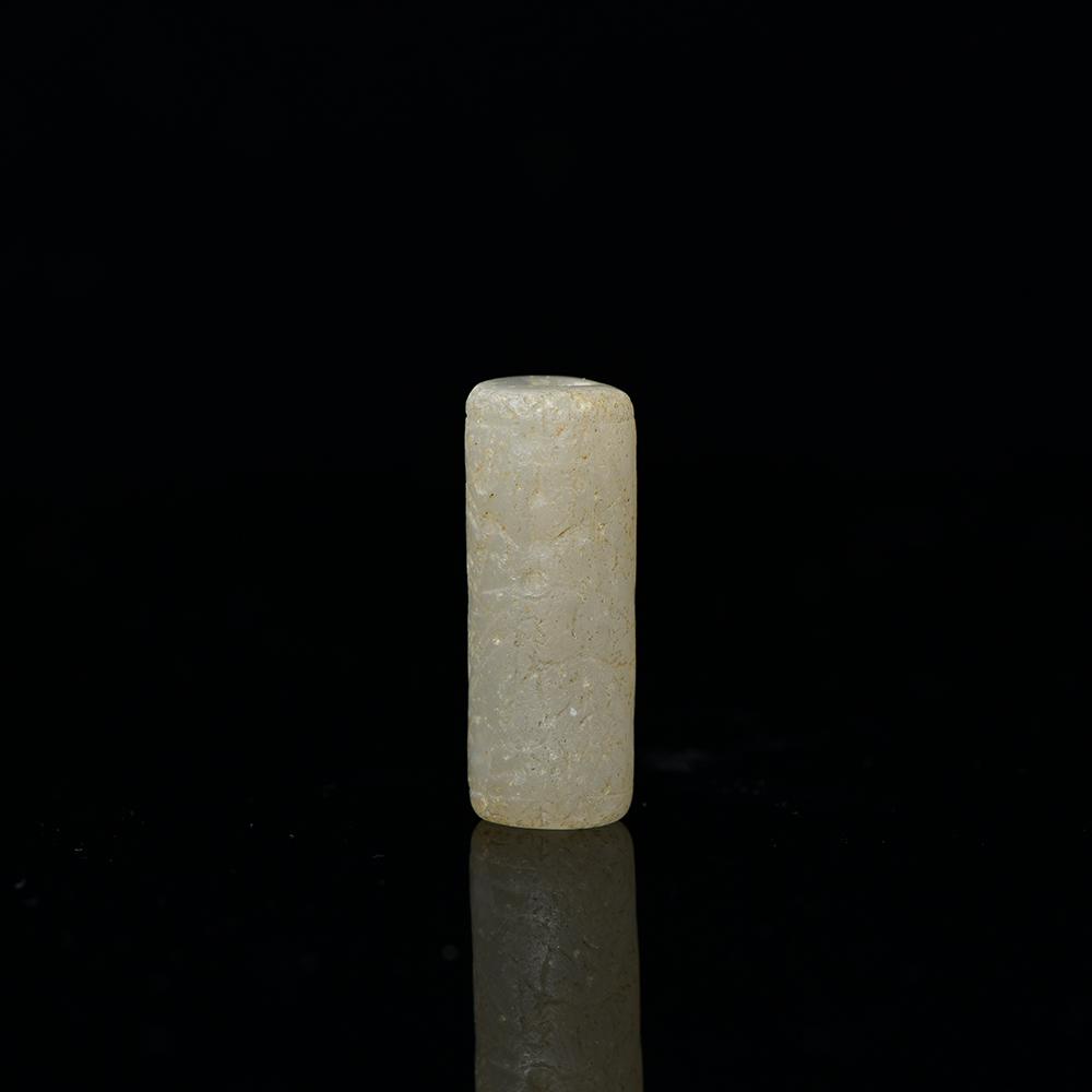 A Near Eastern Chalcedony Cylinder Seal, Old Babylonian Period, ca. 2000 - 1600 BCE