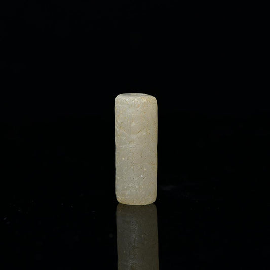 A Near Eastern Chalcedony Cylinder Seal, Old Babylonian Period, ca. 2000 - 1600 BCE