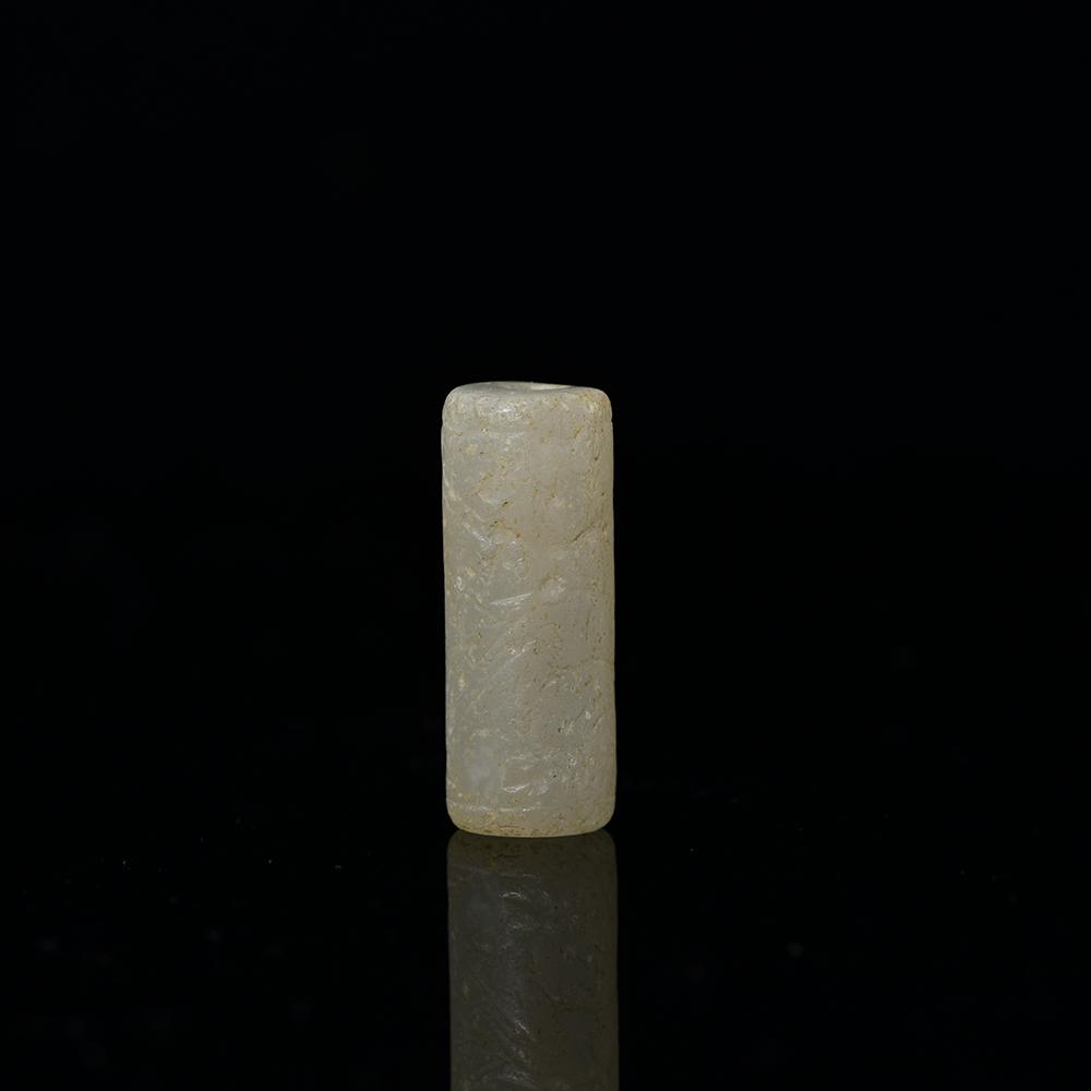 A Near Eastern Chalcedony Cylinder Seal, Old Babylonian Period, ca. 2000 - 1600 BCE