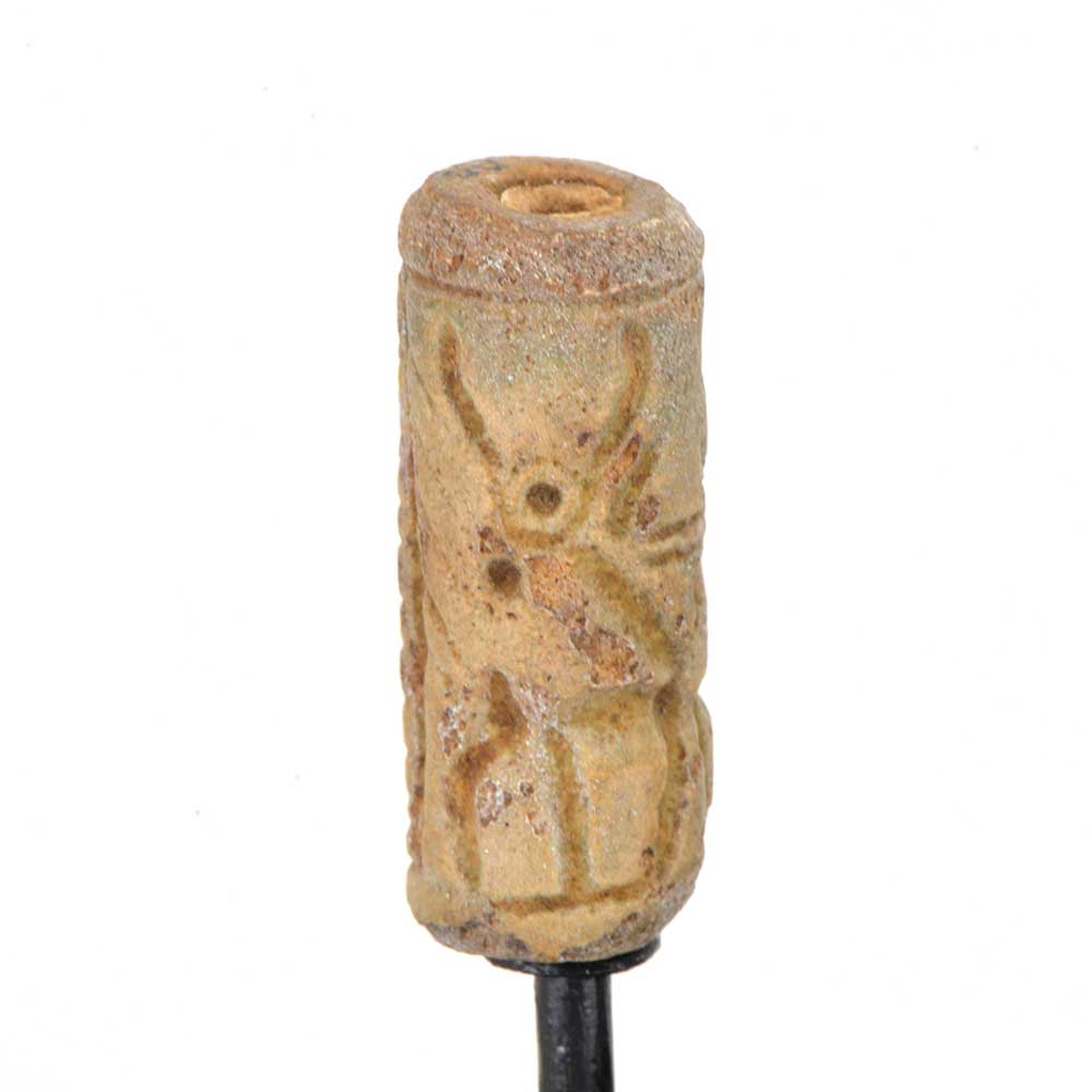 A Mittonian Frit Cylinder Seal, Northern Mesopotamia, circa 1400-1100 BCE