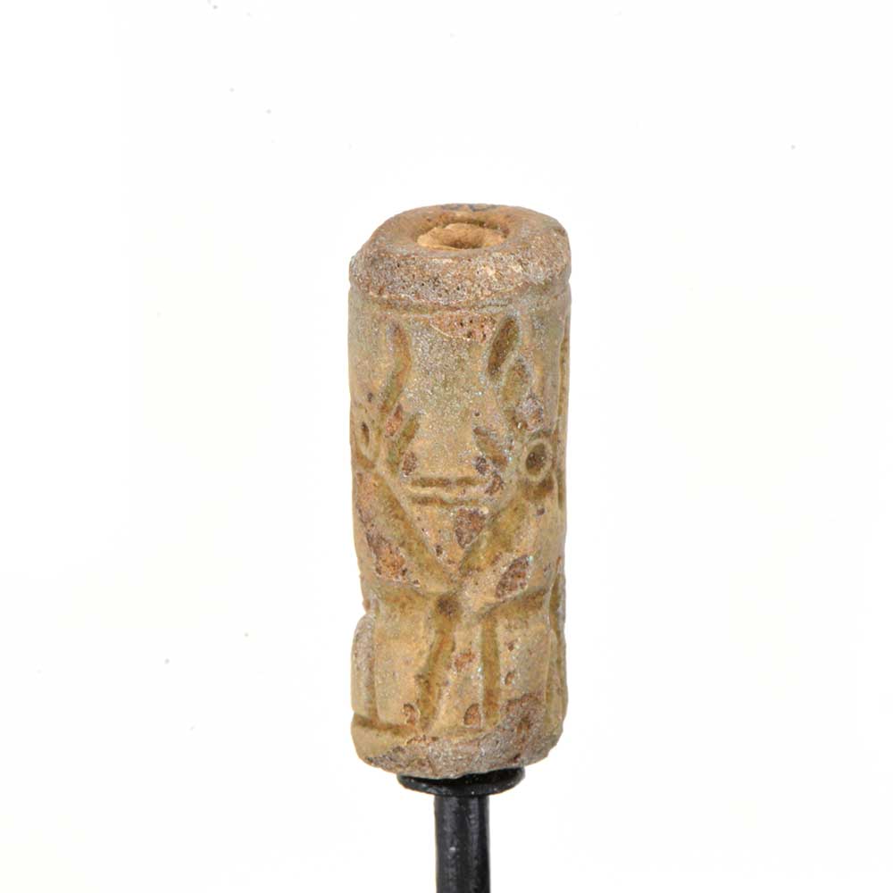 A Mittonian Frit Cylinder Seal, Northern Mesopotamia, circa 1400-1100 BCE