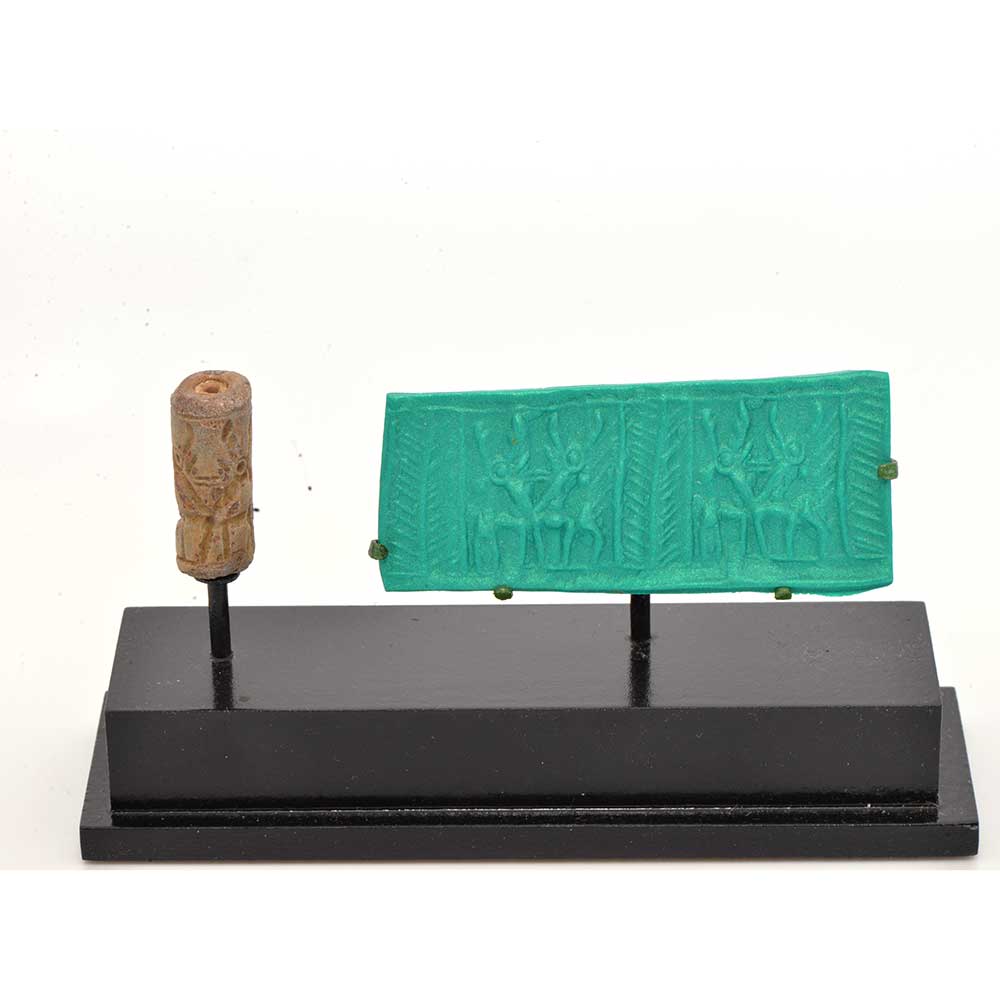 A Mittonian Frit Cylinder Seal, Northern Mesopotamia, circa 1400-1100 BCE