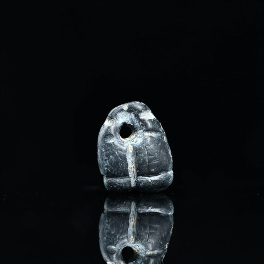 A Mesopotamian Triangular Pendant Seal, Late Chalcolithic Period, ca. 4500-3200 BCE