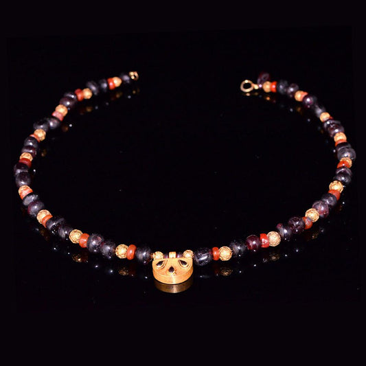 A Near Eastern Garnet and Carnelian Bead Necklace, ca. 1st millennium BCE