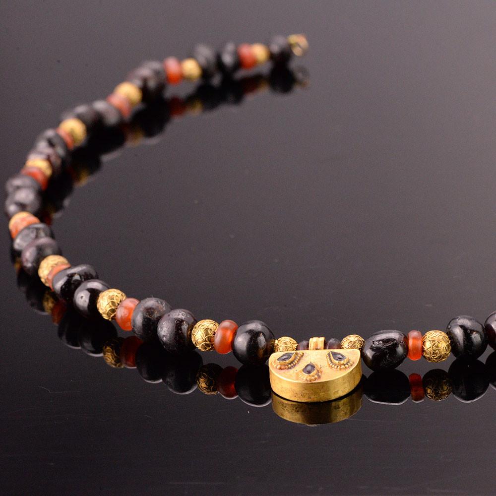 A Near Eastern Garnet and Carnelian Bead Necklace, ca. 1st millennium BCE