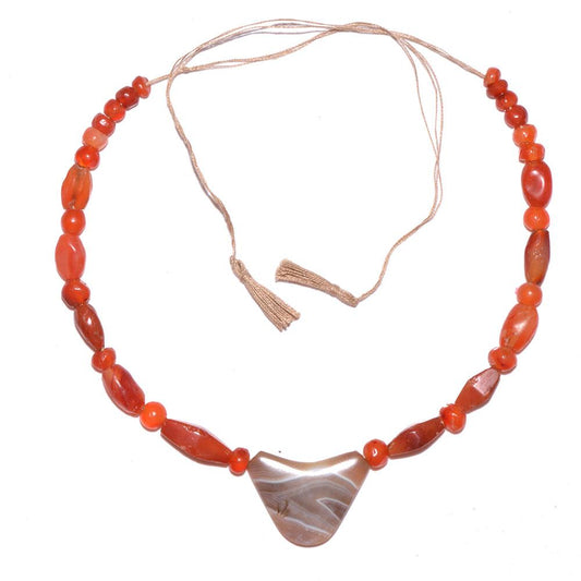 An Achaemenid Carnelian and Banded Agate Bead Necklace, ca. 550 - 332 BCE