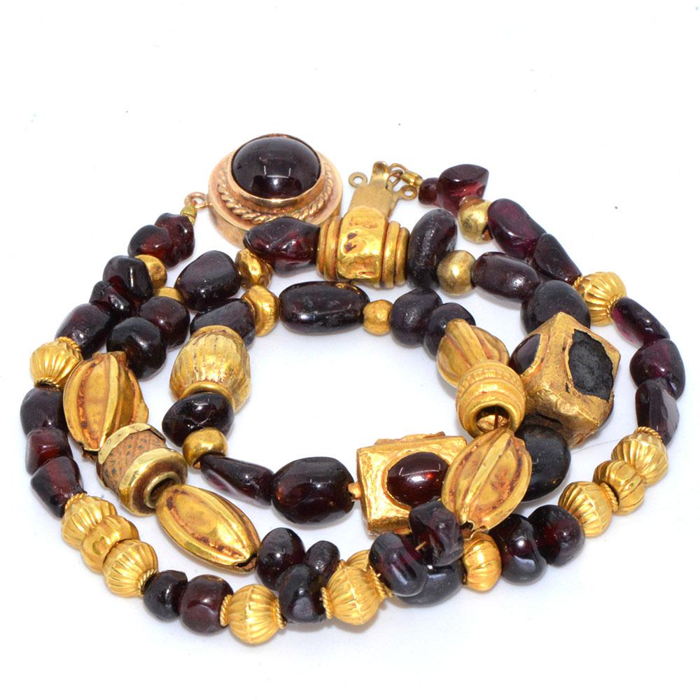 A superb Gold and Garnet Bead Necklace, Achaemenid Period, Persia, ca 550 - 300 BC