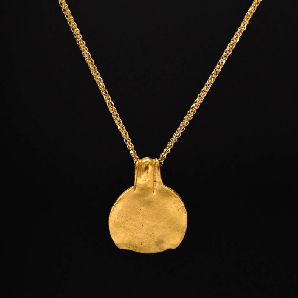 A Near Eastern Gold Pendant, Roman Period, ca. 1st century CE