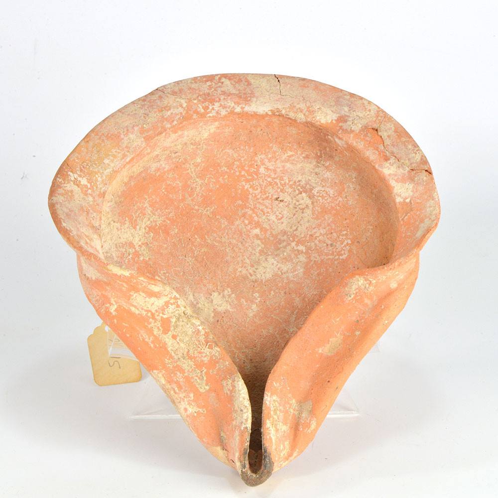 A large terracotta Shell-type Oil Lamp, Persian Period, ca. 500 BCE