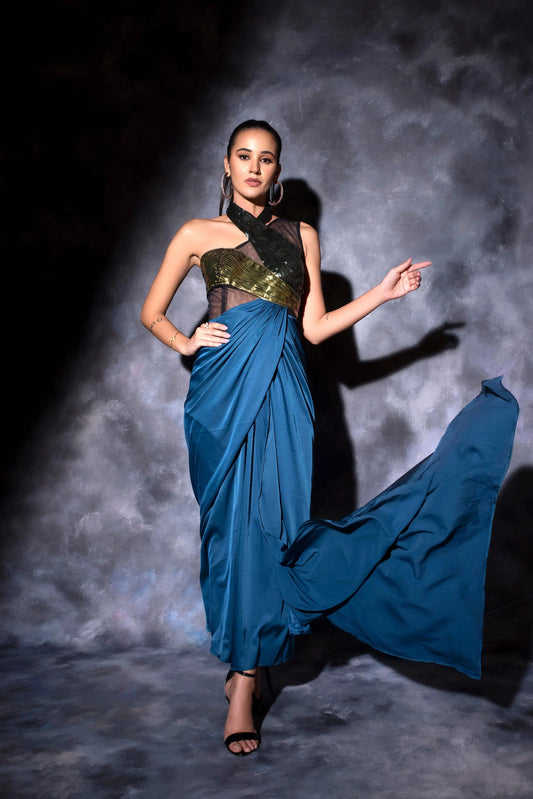 One shoulder drape in teal blue with a metallic molded drape dress