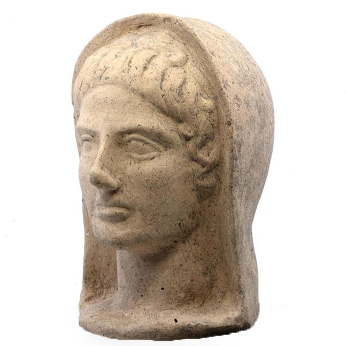 An Etruscan Terracotta Votive Head of A Youth, ca. 4th Century BCE