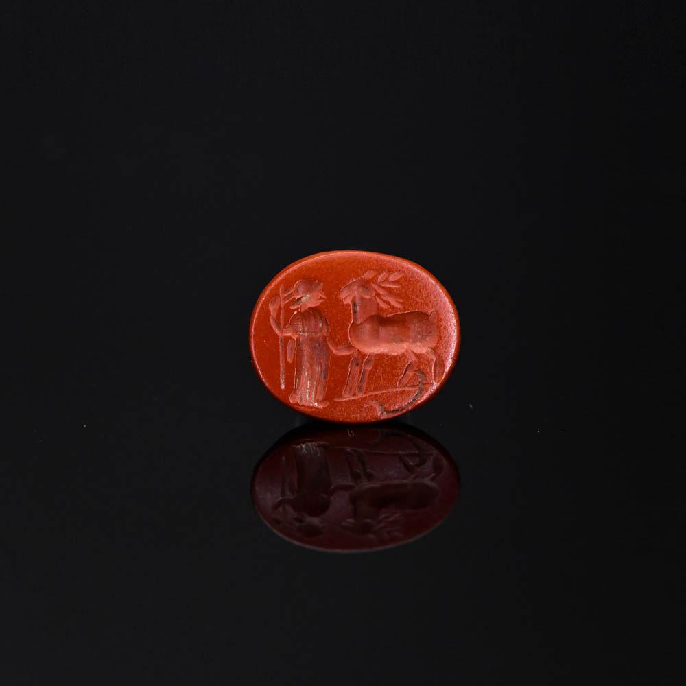 A Roman Red Jasper Intaglio of Diana and Stag, Roman Imperial Period, ca. 1st - 3rd century CE