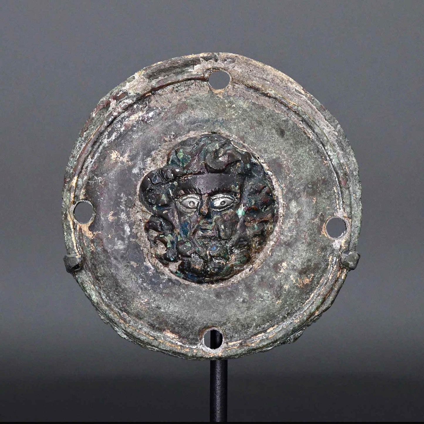 A Roman Bronze Roundel of Zeus-Ammon, ca. 1st - 2nd century CE