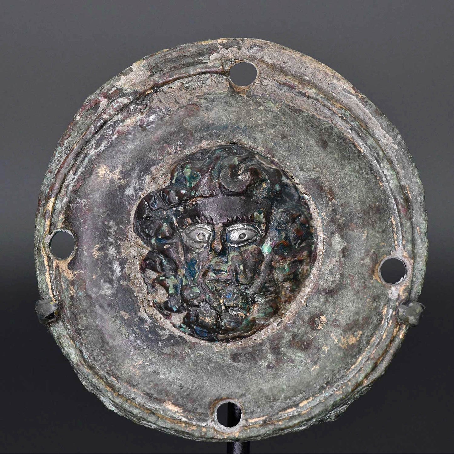 A Roman Bronze Roundel of Zeus-Ammon, ca. 1st - 2nd century CE