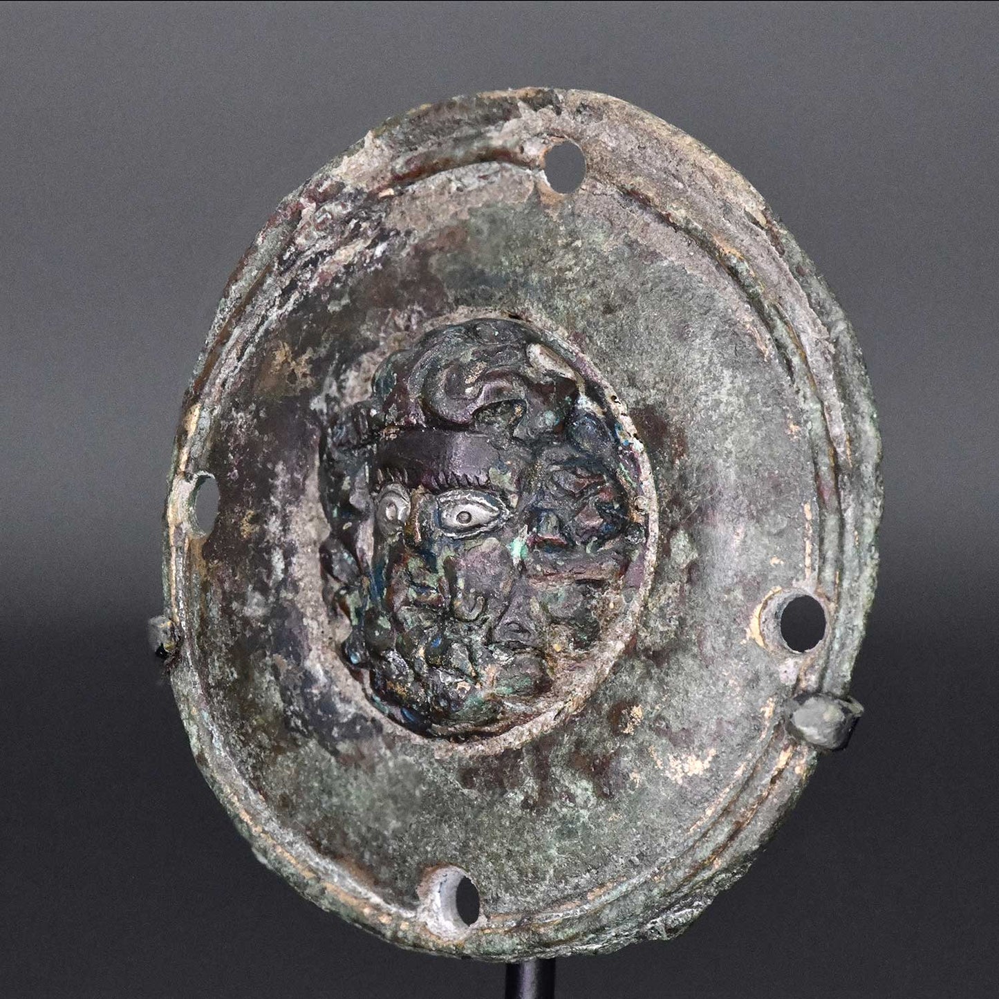 A Roman Bronze Roundel of Zeus-Ammon, ca. 1st - 2nd century CE