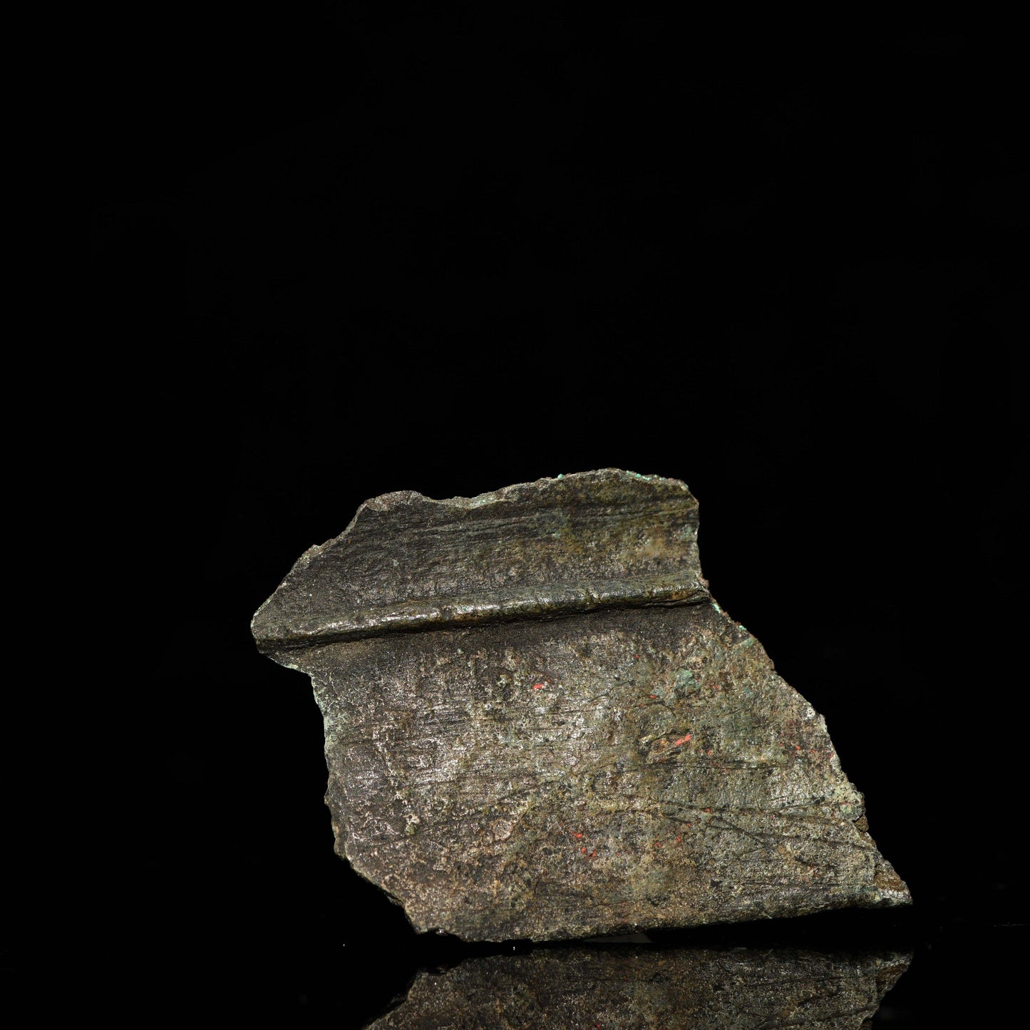 A Roman Bronze Vessel Sherd, Roman Imperial Period, ca. 2nd - 3rd century CE