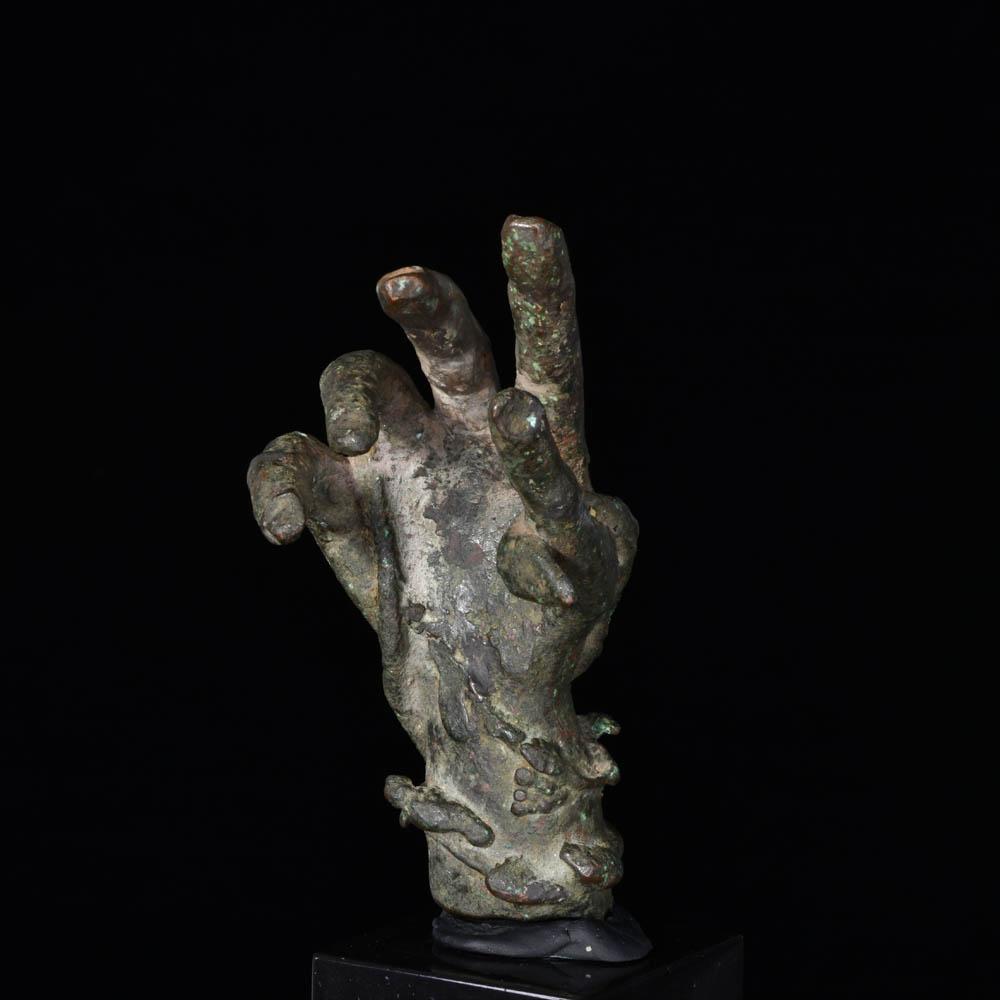 A Roman Bronze hand of Sabazios, Roman Imperial Period, ca. 2nd - 3rd century CE