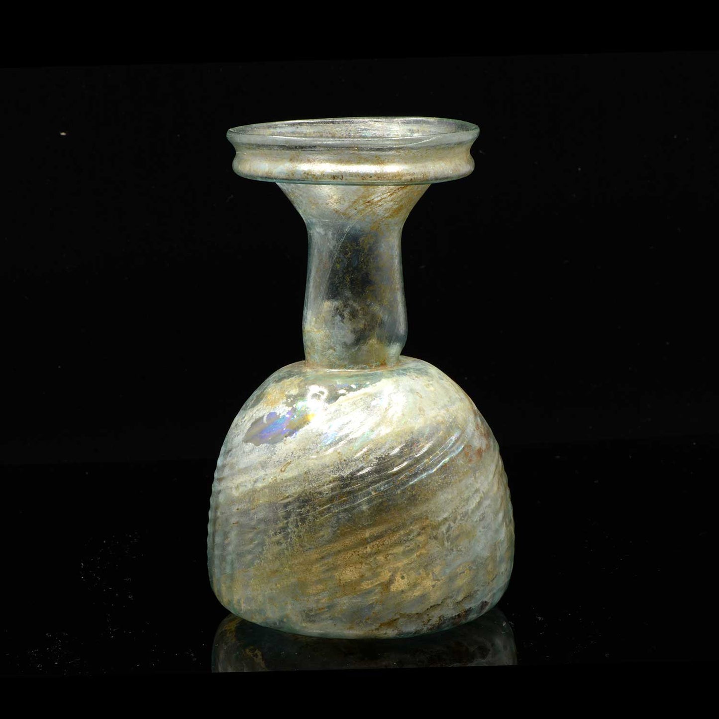 A Roman Swirled Glass Sprinkler Flask, 4th Century CE