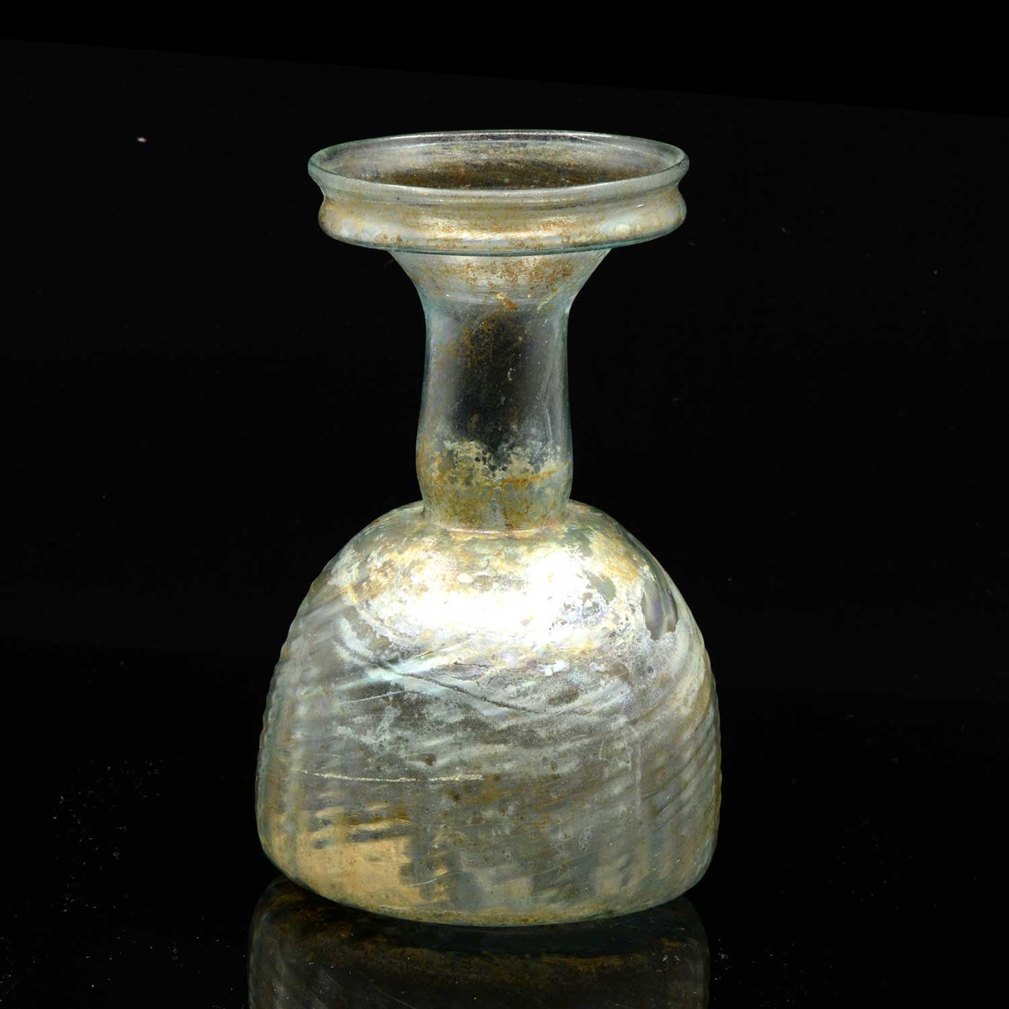 A Roman Swirled Glass Sprinkler Flask, 4th Century CE