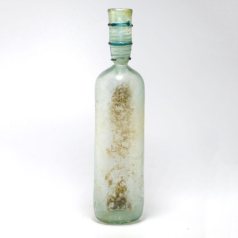 A large Roman Glass Bottle, 1st Century CE