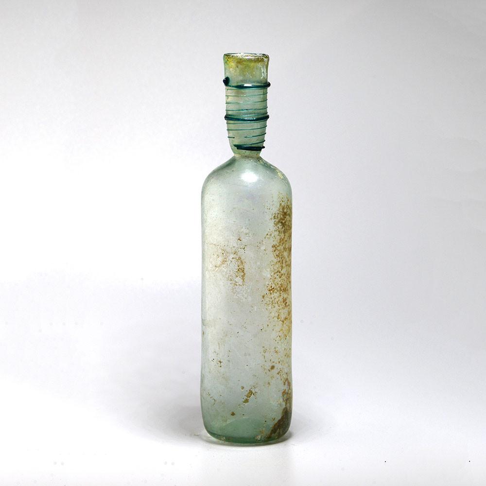 A large Roman Glass Bottle, 1st Century CE