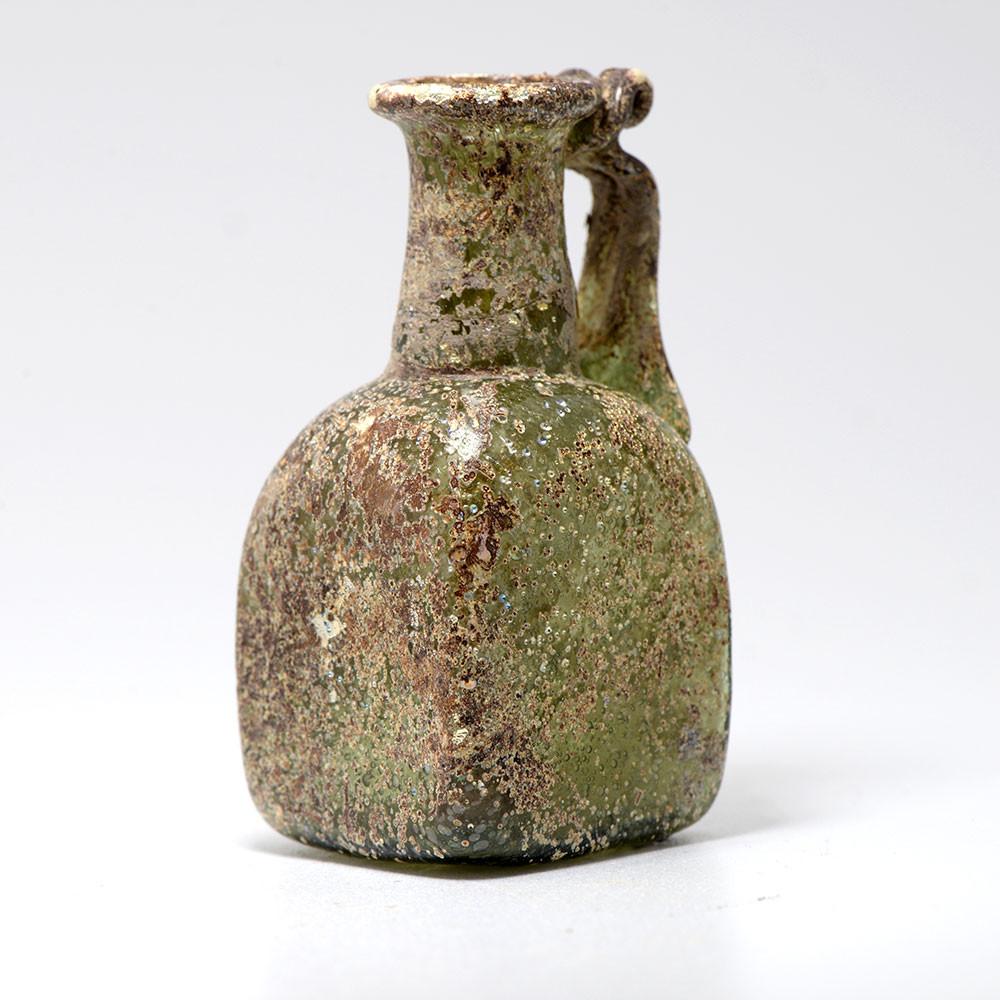 A Roman Green Glass Juglet, 2nd- 3rd Century CE