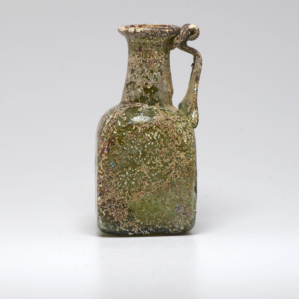 A Roman Green Glass Juglet, 2nd- 3rd Century CE