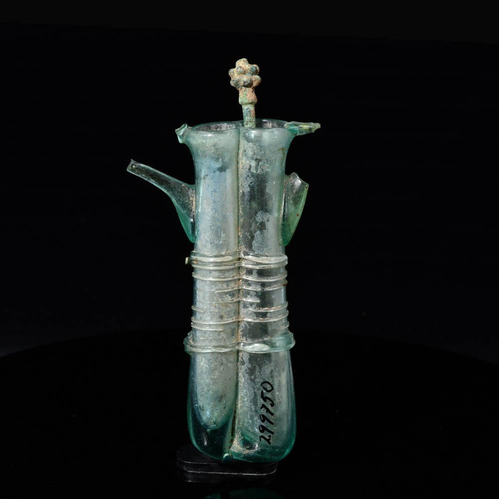 A Roman Glass Double Balsamarium with Applied Handles, ca. 4th century CE