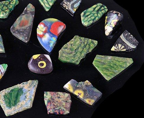 A group of Romano-Egyptian Mosaic Glass Vessel and Tile Fragments, ca 1st century BCE/CE