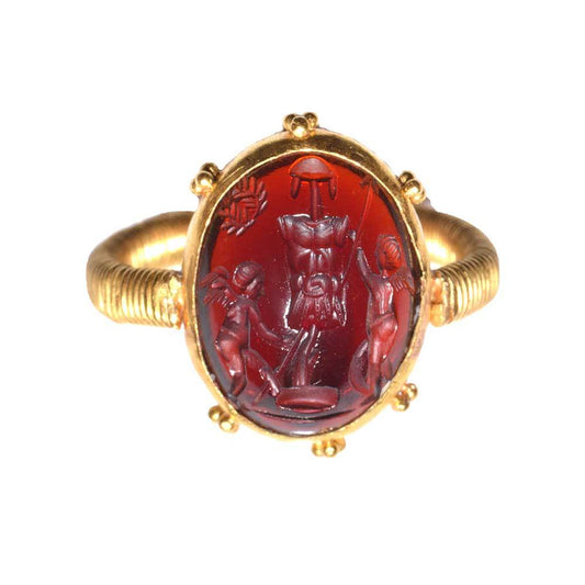 A Gold and Garnet Intaglio Ring, Etruscan Revival, ca. 19th Century