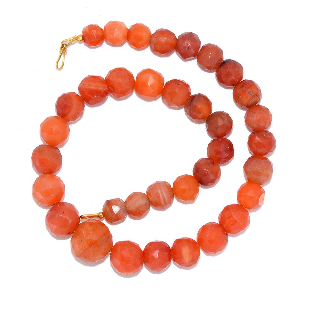 A Roman Carnelian Faceted Bead Necklace, Roman Imperial Period, ca. 1st - 2nd century CE