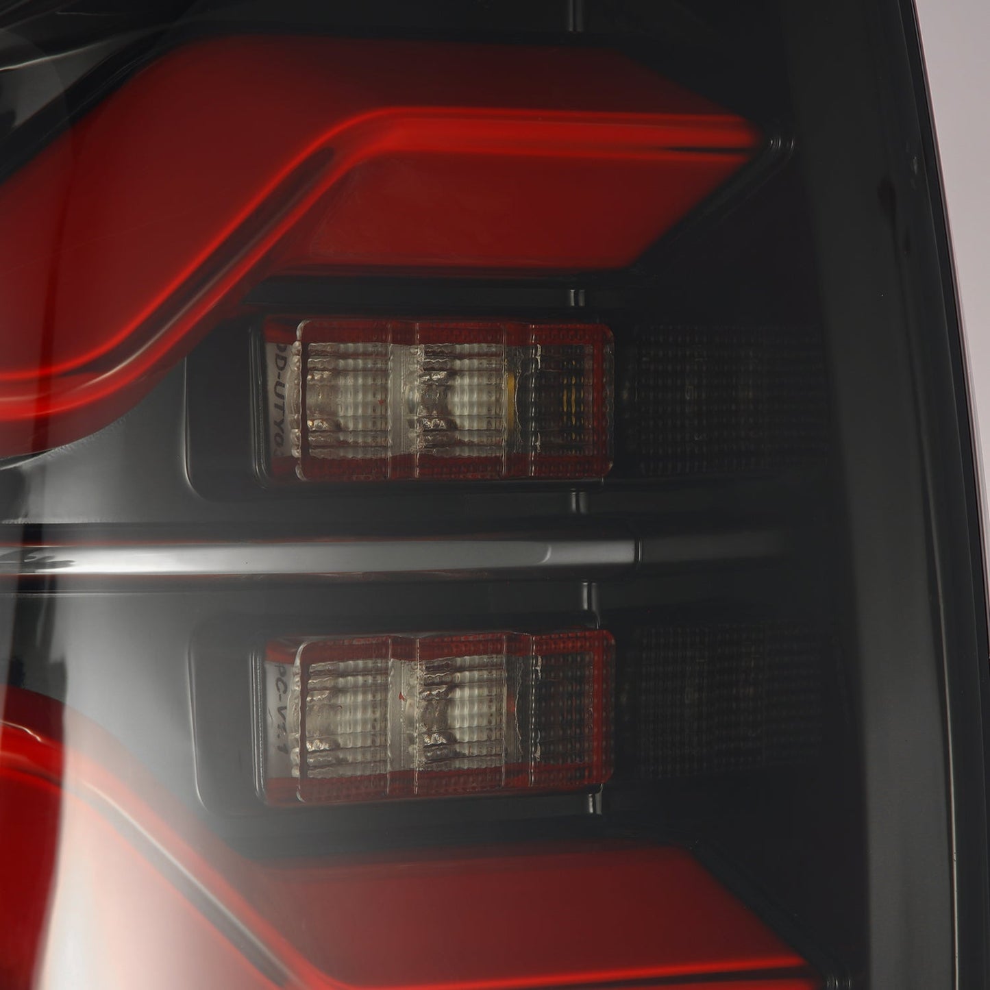 AlphaRex 16-21 Toyota Tacoma LUXX LED Taillights Blk/Red w/Activ Light/Seq Signal (arx680000)
